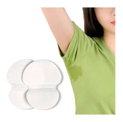 Almohadillas absorbentes para axilas contra sudor excesivo en camiseta verde